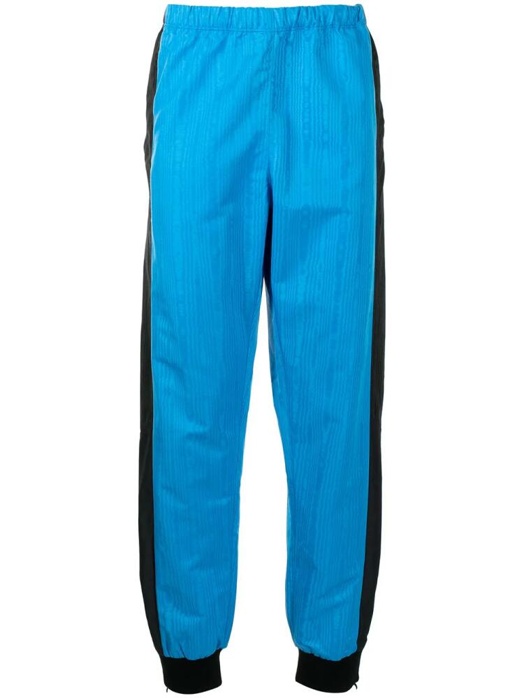 Marine Serre satin-finish track pants - Blue Cover