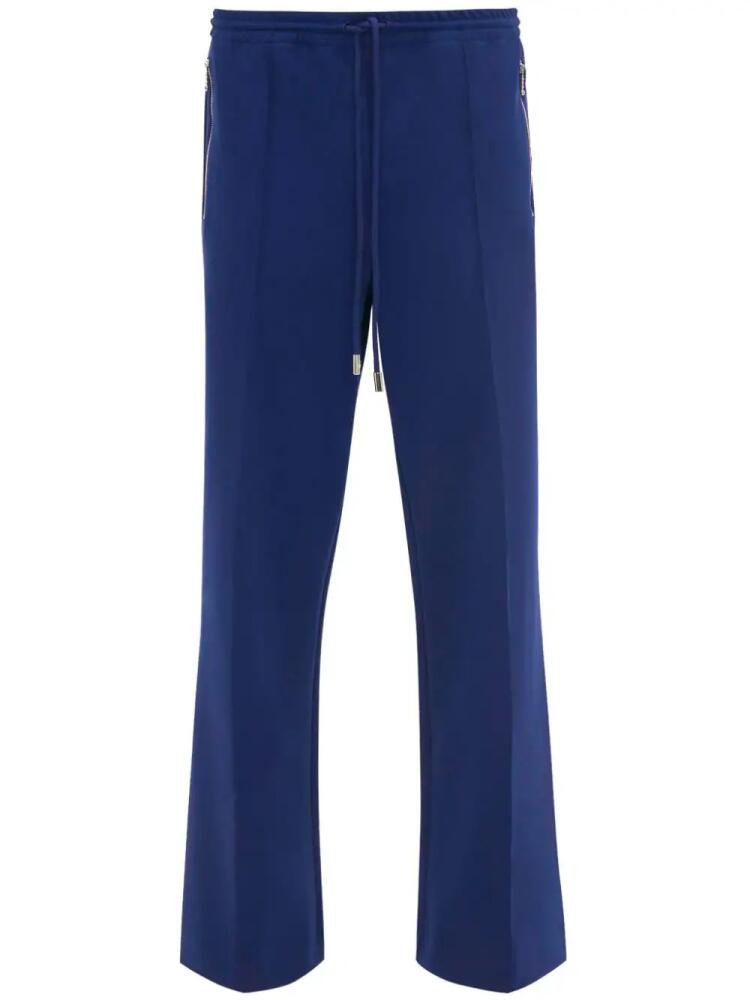 JW Anderson flared track pants - Blue Cover