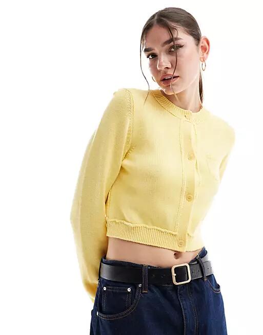 ASOS DESIGN crew neck cropped cardigan with pocket in cotton blend in lemon-Yellow Cover