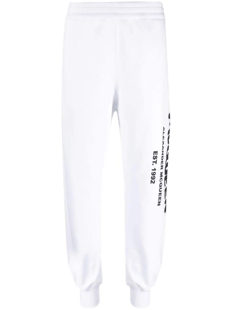 Alexander McQueen logo-print tapered track pants - White Cover