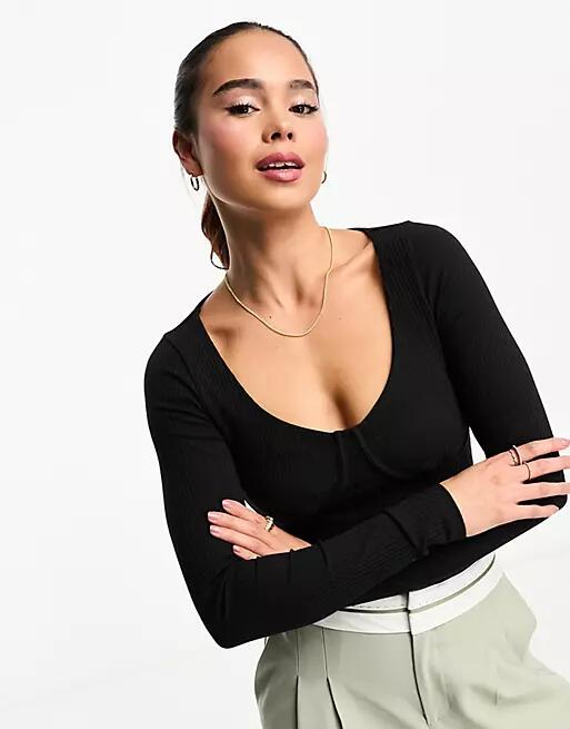 ASOS DESIGN rib bodysuit with bust seams and long sleeve in black Cover