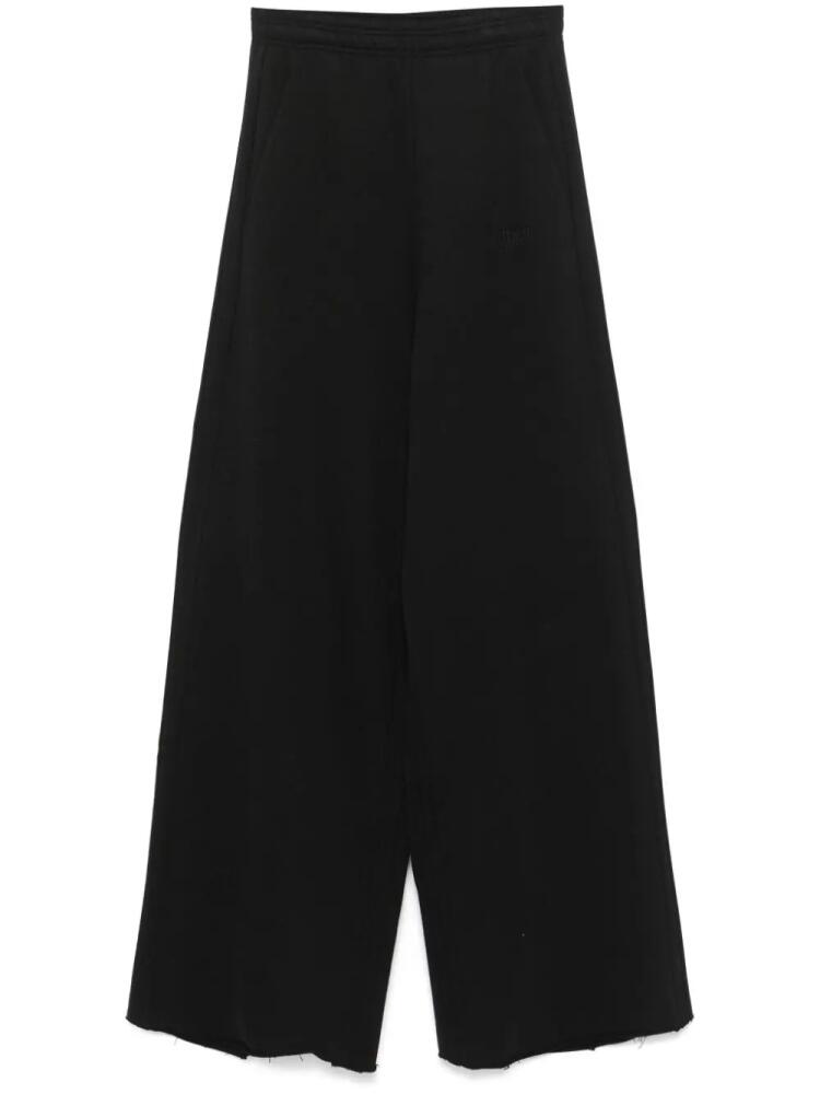 VETEMENTS wide-leg track pants - Black Cover