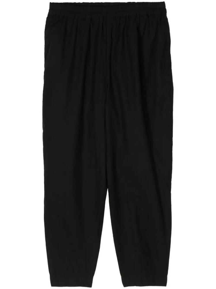 Toogood The Acrobat cotton tapered trousers - Black Cover