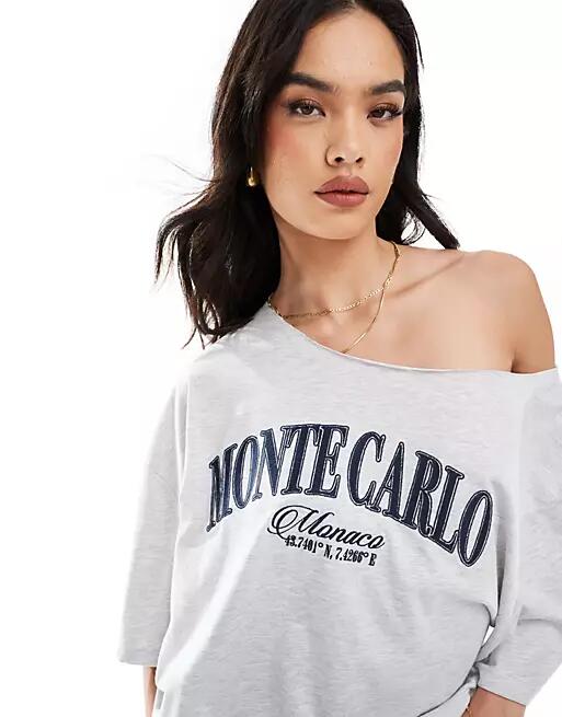 ASOS DESIGN relaxed off shoulder T-shirt with monte carlo graphic in green Cover