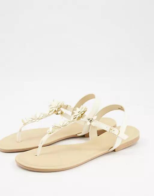 Oasis flower toe post sandals in white Cover