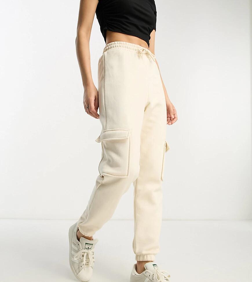 River Island Petite cargo pants with pocket detail in beige-Neutral Cover