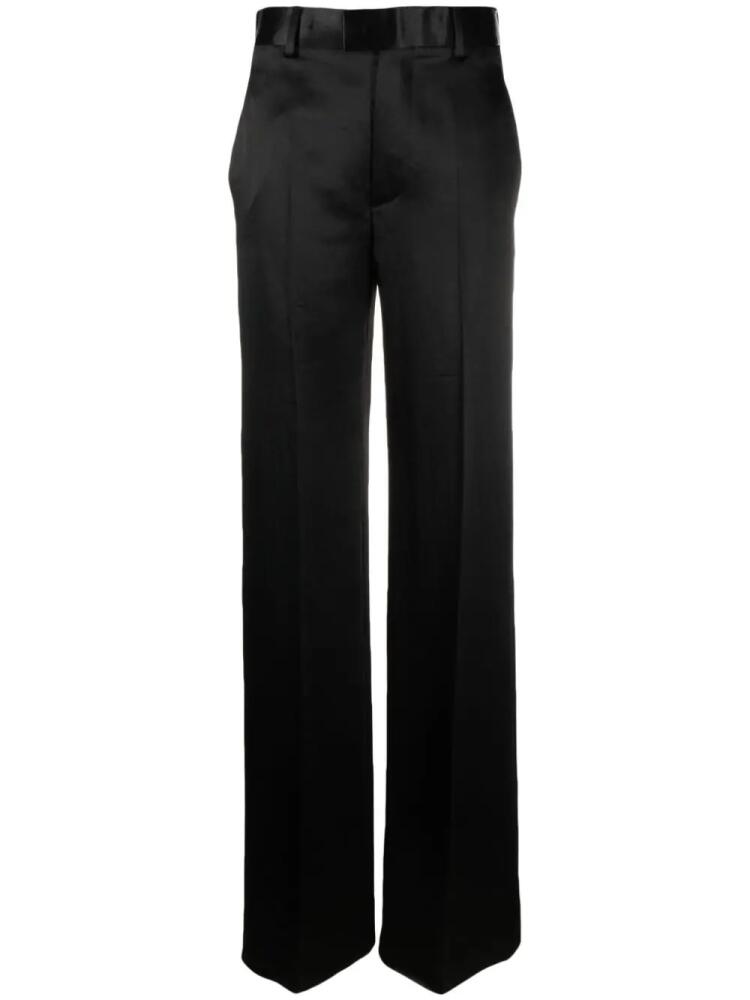 Ann Demeulemeester pressed-crease satined trousers - Black Cover