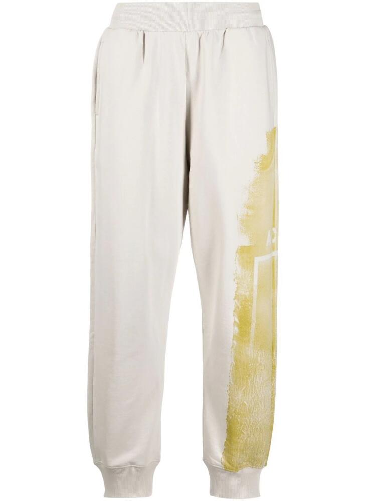 A-COLD-WALL* graphic-print cotton joggers - Neutrals Cover