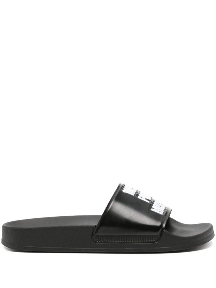 Moschino logo-embossed textured slides - Black Cover