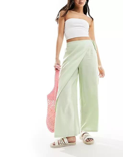 ASOS DESIGN wrap pants with linen in green Cover