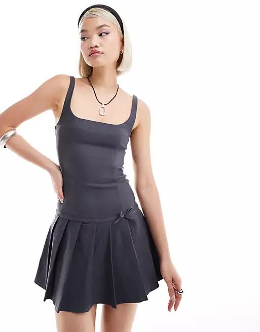 Motel jadzia dropped waist pleated mini dress in charcoal gray Cover