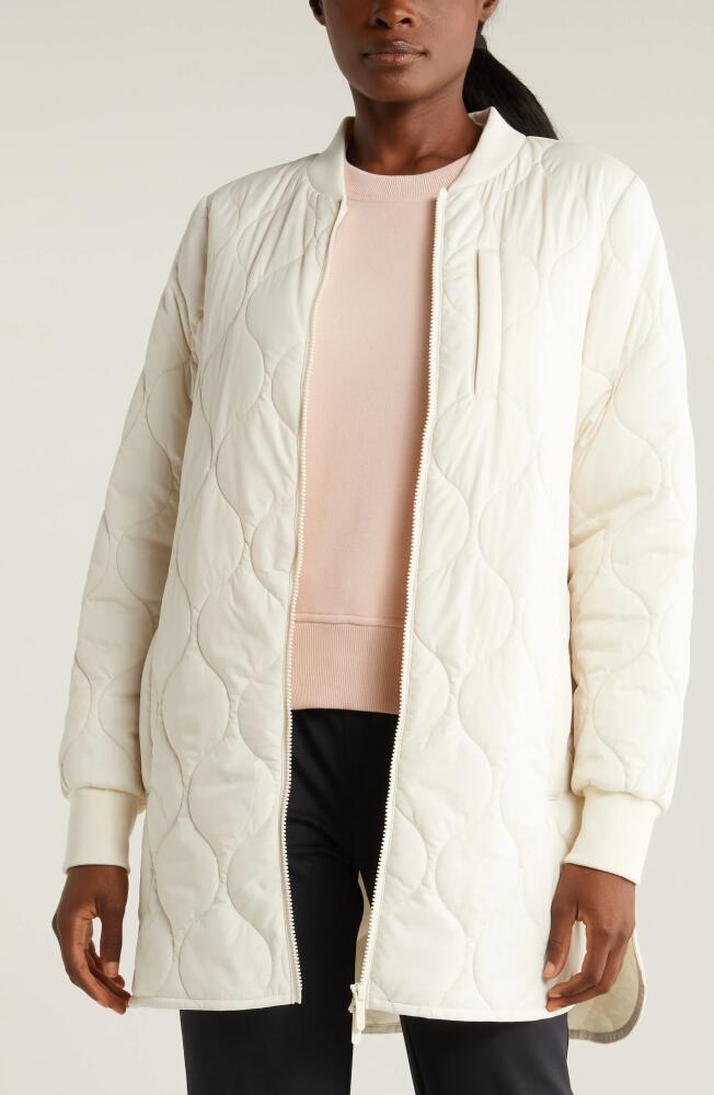 Zella Longline Onion Quilted Bomber Jacket in Ivory Egret Cover