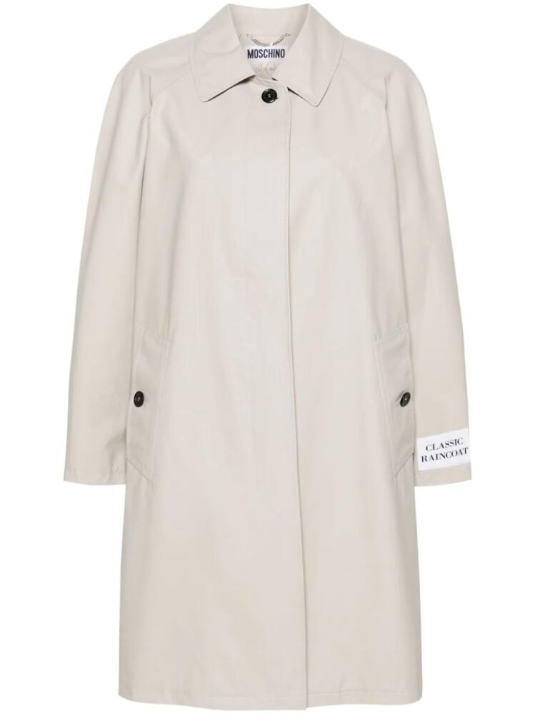 Moschino patch-detail midi trench coat - Neutrals Cover