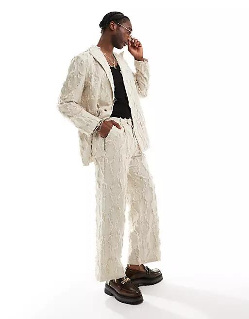 Reclaimed Vintage limited edition suit pants with fraying in beige-Neutral Cover