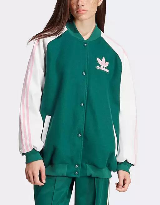 adidas Originals Superstar varsity jacket with pink detail in collegiate green Cover