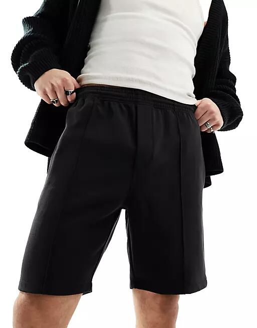 Weekday Ken relaxed fit shorts in black Cover