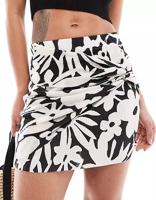 ONLY knot front mini skirt in pink floral abstract Cover