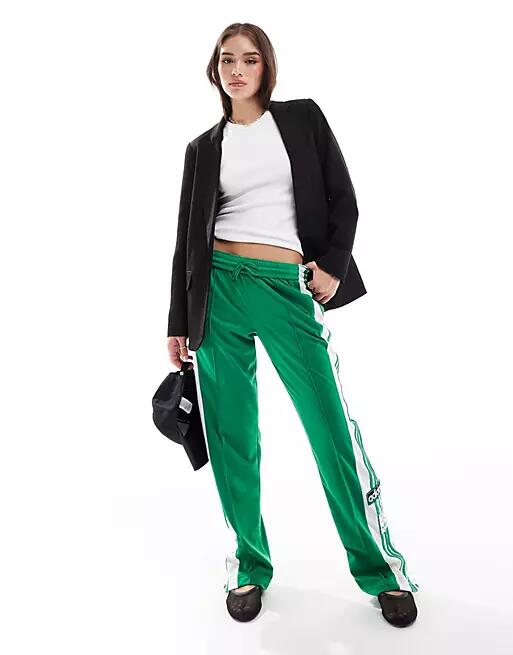 adidas Originals Adibreak track pants in green Cover