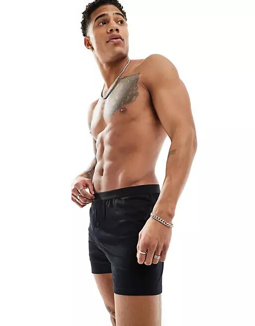 ASOS DESIGN single jersey boxers in black Cover