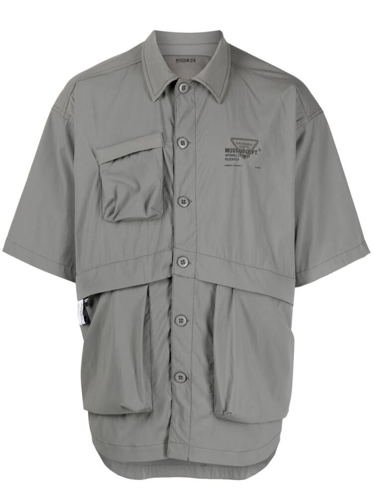 Musium Div. logo-print multi-pocket shirt - Grey Cover