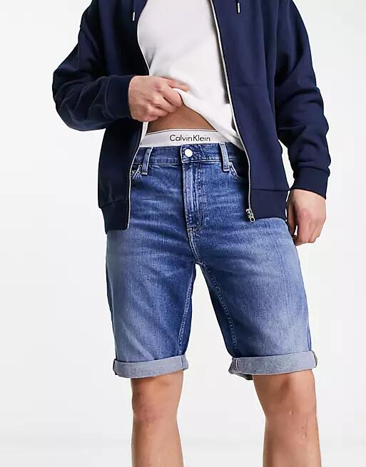 Calvin Klein Jeans cc slim denim shorts in mid wash blue Cover