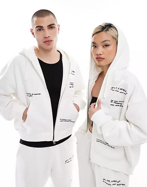 Weekday Unisex boxy fit zip up hoodie with graphic text print in off-white - part of a set - Exclusive to ASOS Cover