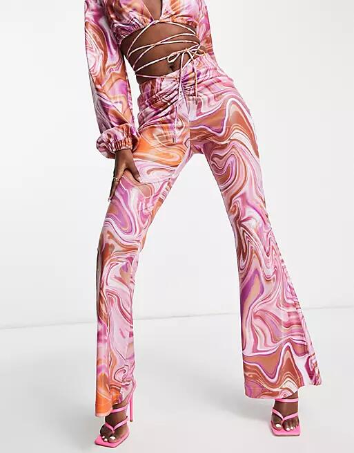 Rare London satin flared pants in pink swirl print - part of a set Cover