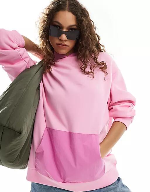 ASOS DESIGN oversized nylon hoodie in pink Cover