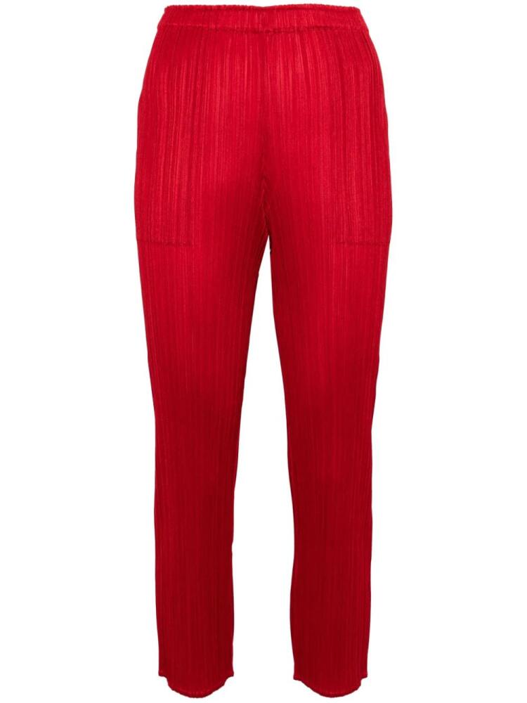 Pleats Please Issey Miyake plissé-effect cropped trousers - Red Cover