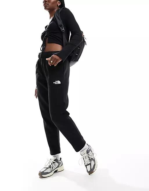 The North Face Evolution Cocoon track pants in black Cover