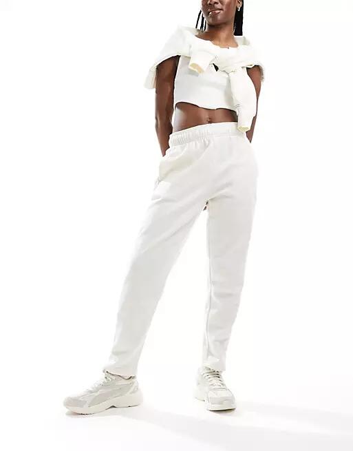 The North Face Evolution Cocoon track pants in white Cover