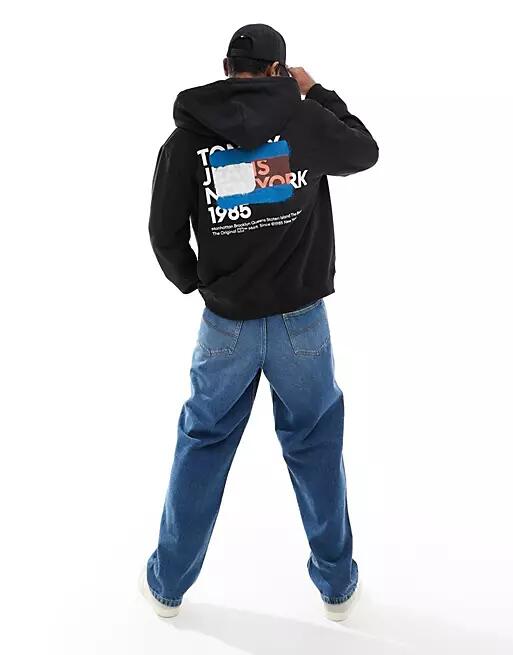 Tommy Jeans graffiti regular zip up hoodie in black Cover