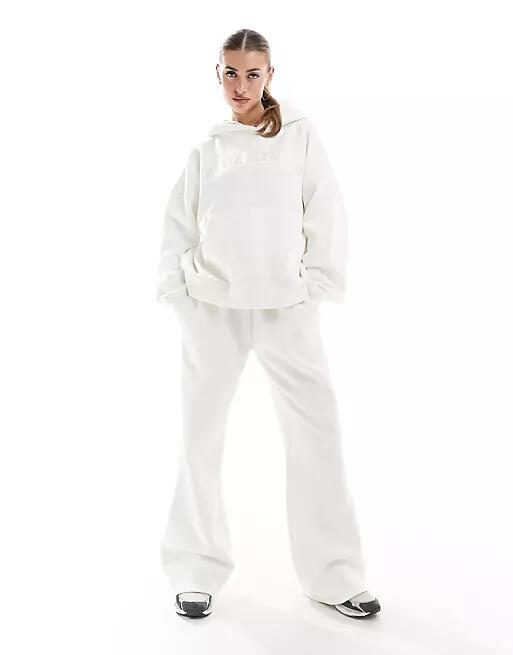 Kaiia logo wide leg sweatpants in white - part of a set Cover