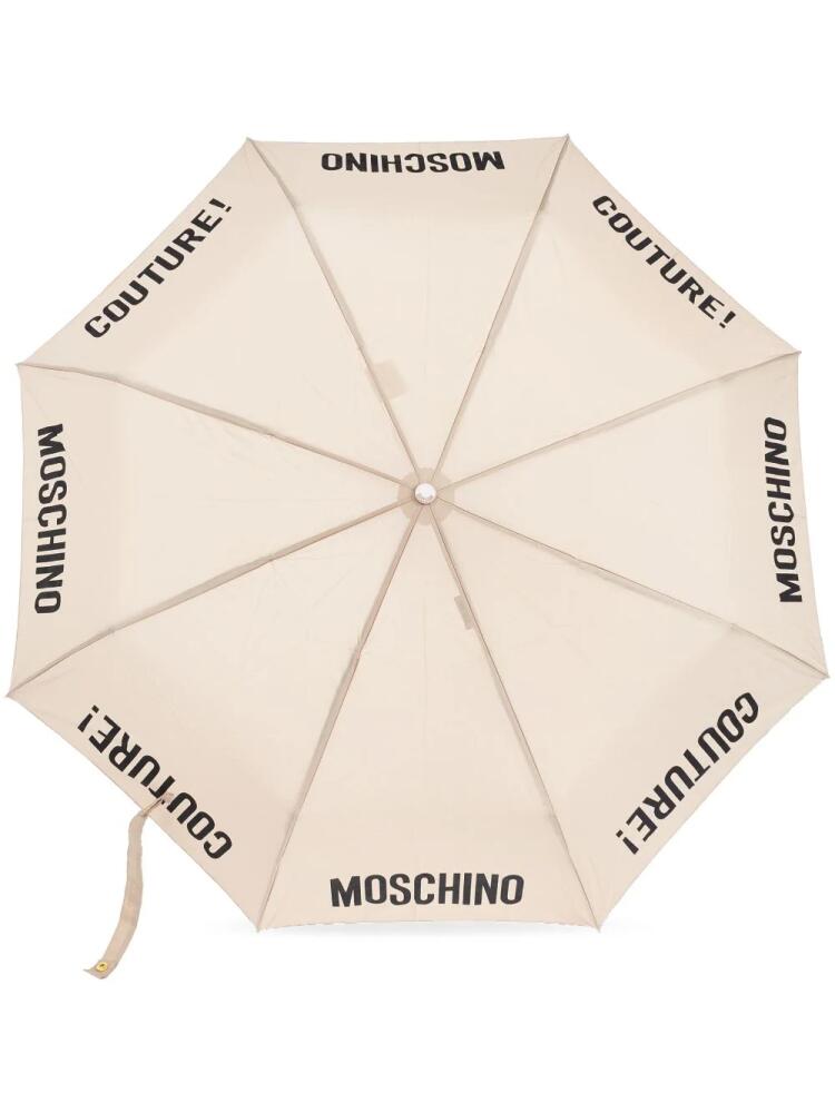 Moschino logo-print compact umbrella - Neutrals Cover