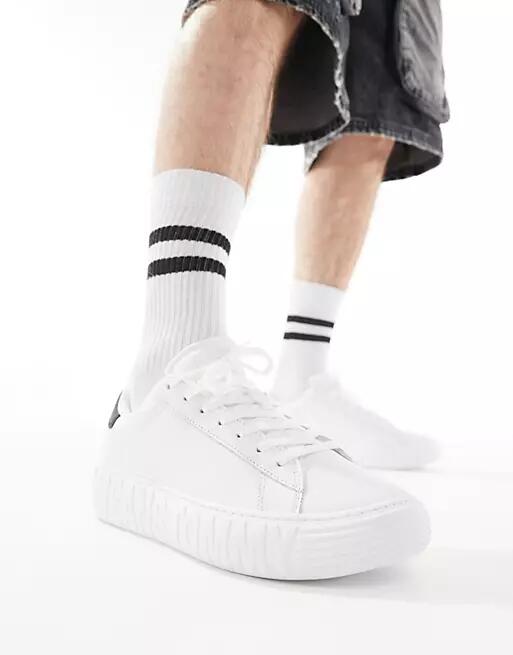 Tommy Jeans leather outsole sneakers in white Cover