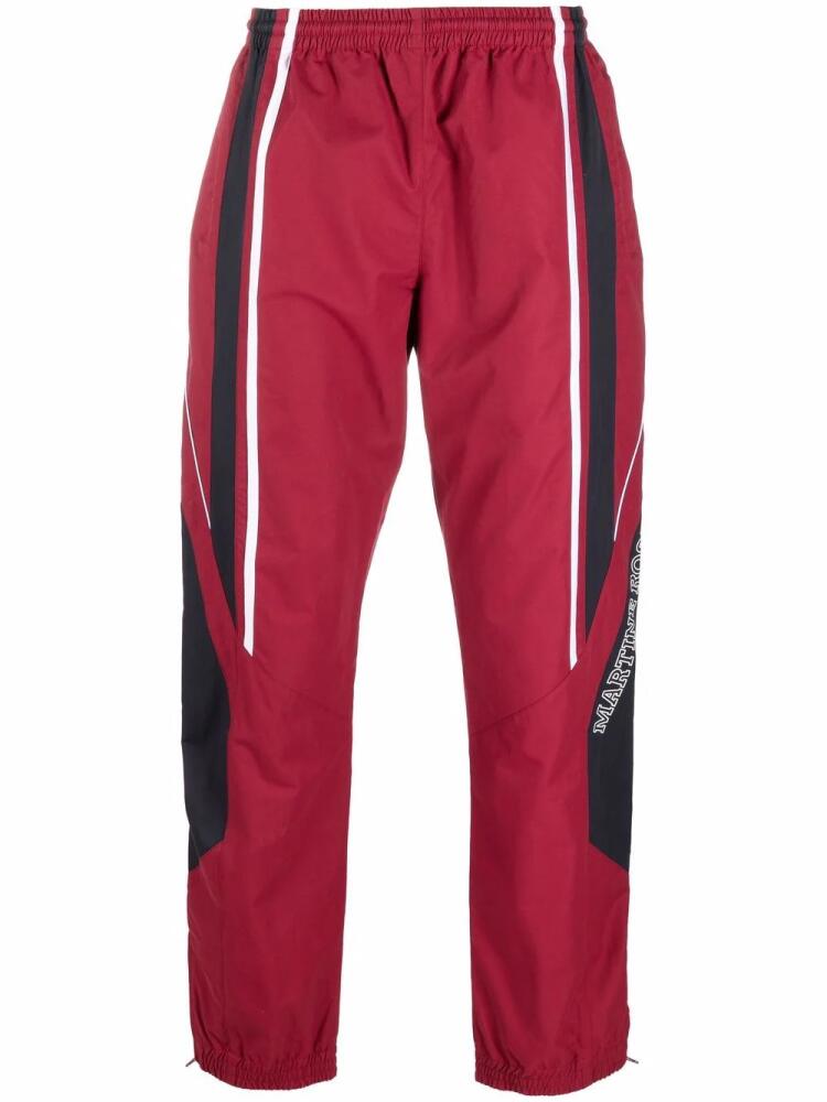 Martine Rose side stripe track pants - Red Cover