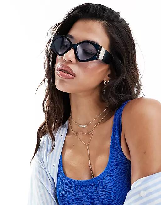 Jeepers Peepers cat eye sunglasses in blue with gold Cover