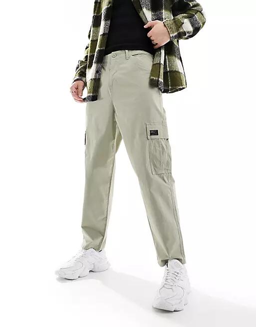 ASOS DESIGN oversized tapered cargo pants in stone with patch-Neutral Cover