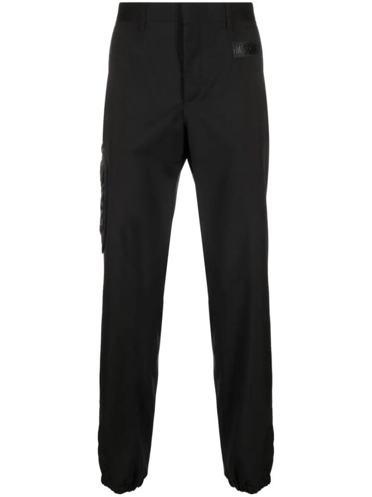 Moschino rubberised-logo tailored trousers - Black Cover