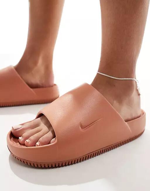 Nike Calm slides in brown Cover