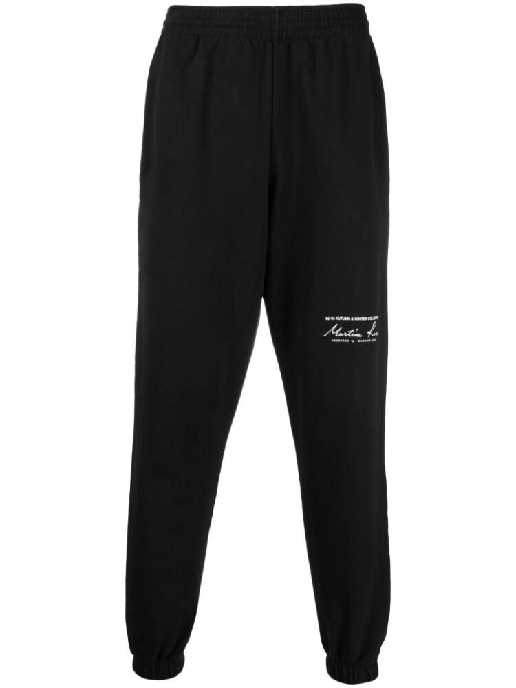 Martine Rose logo-print slim-fit track pants - Black Cover