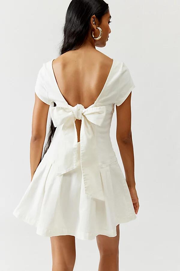 Urban Outfitters UO Bryan Bow-Back Pleated Denim Mini Dress in Ivory Cover