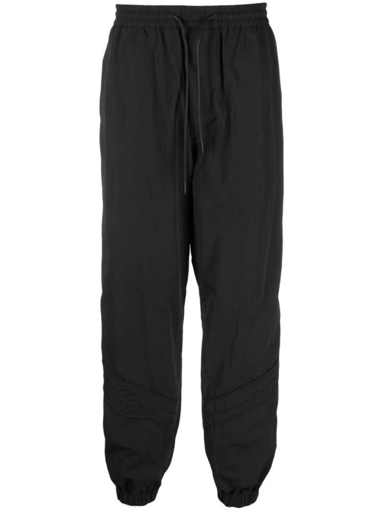 Juun.J tapered-leg drawstring track pants - Black Cover