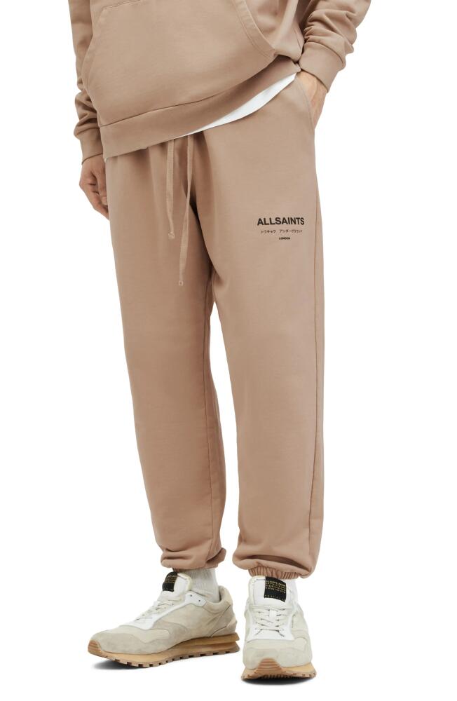 AllSaints Underground Logo Graphic Joggers in Toffee Taupe Cover