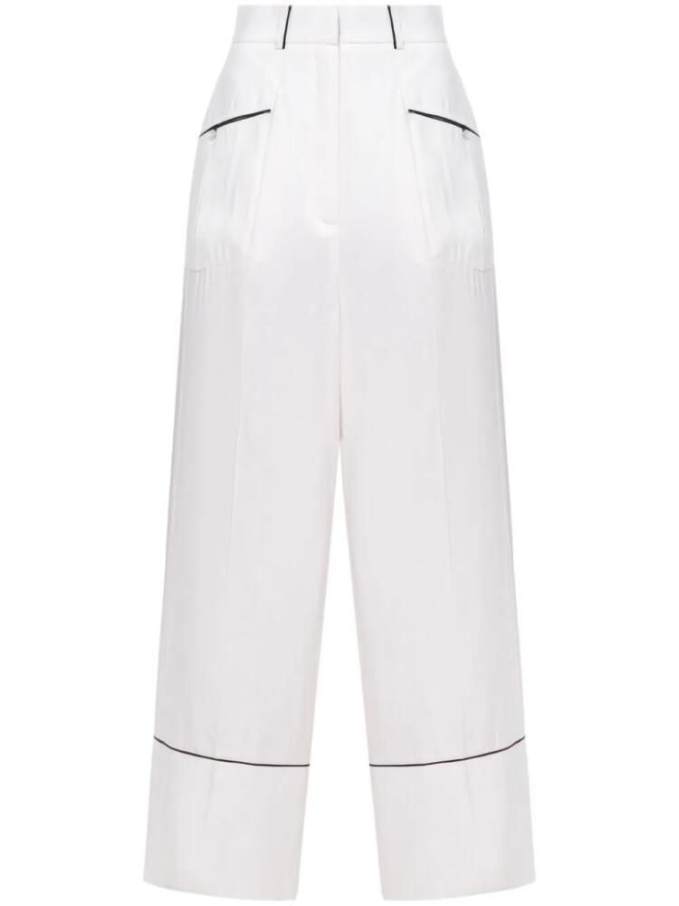 A.M.G. piped-trim trousers - White Cover