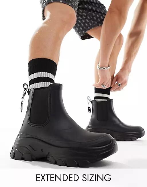 ASOS DESIGN chunky wellington boot with back chain detail-Black Cover