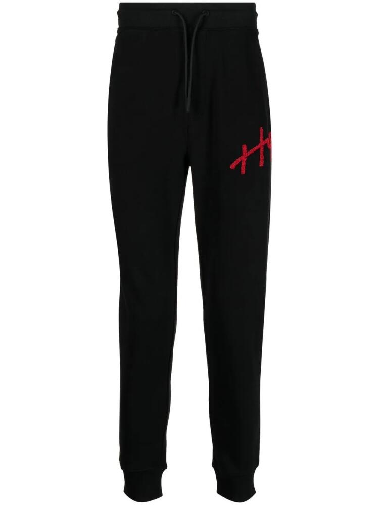 HUGO logo-appliqué track pants - Black Cover