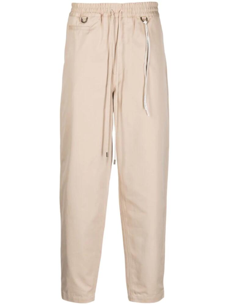 Mastermind Japan logo-embroidered tapered trousers - Neutrals Cover