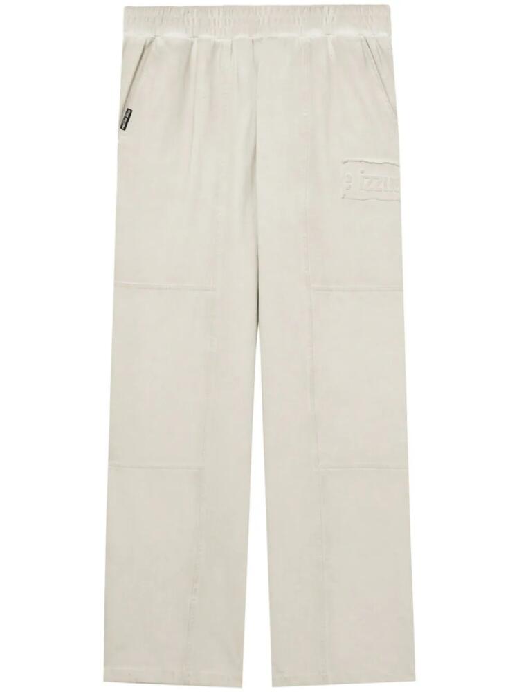 izzue logo-embossed cotton track pants - Neutrals Cover