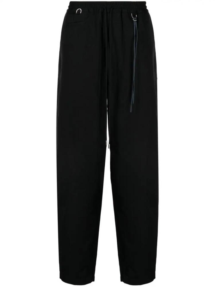 Mastermind Japan skull-appliqué track pants - Black Cover